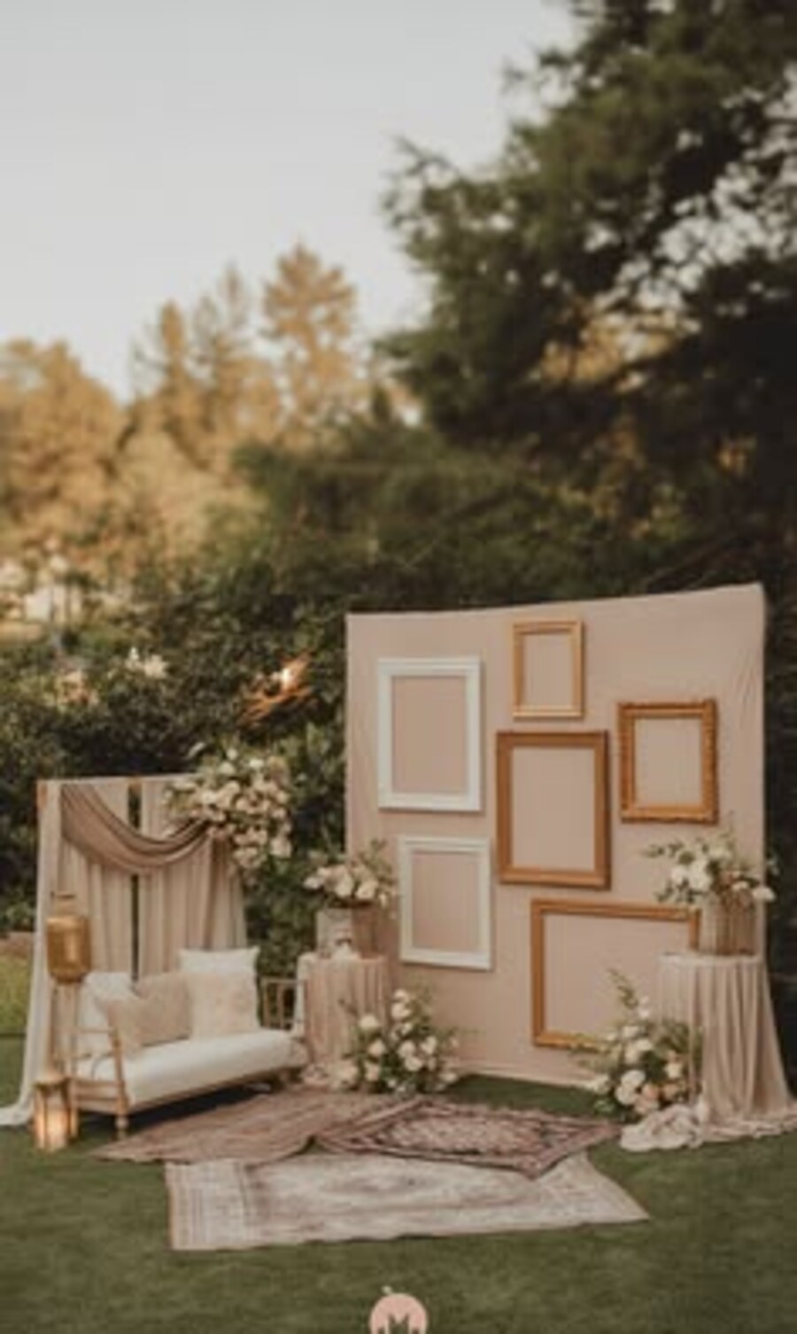 Draped setting with gilded frames and soft furnishings